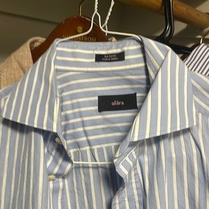 Made in Turkey, light blue striped down with white.